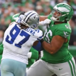 Tyler Steen 56 Of The Eagles Blocks Osa Odighizuwa 97 Of The Cowboys At Lincoln Financial Field
