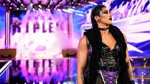 Female Wwe Personality Backstage At Monday Night Raw Smiling With Arena Lighting