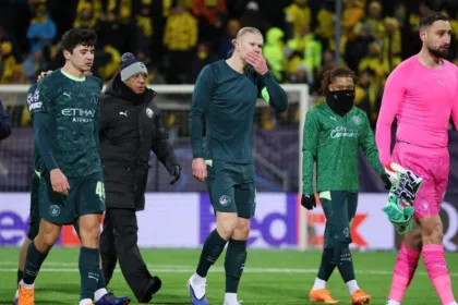 Manchester City Players And Fans Exchanging Ticket Refund Gestures Outside A Stadium In Snowy Conditions